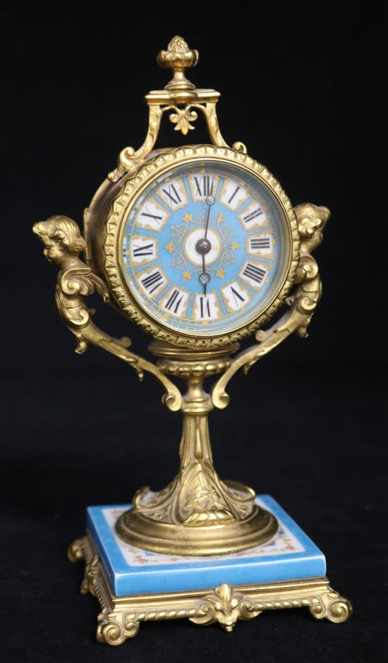 Louis XVI style gilt brass and porcelain clock 21cms